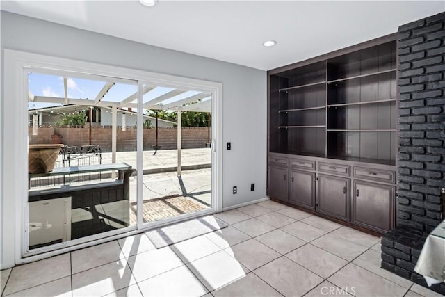 43657 21st St W, Lancaster, CA 93536 - unfurnished dining area with light tile patterned floors and recessed lighting