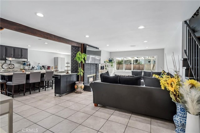 43657 21st St W, Lancaster, CA 93536 - living area with light tile patterned floors and recessed lighting