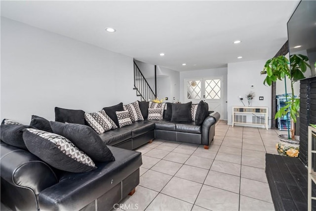 43657 21st St W, Lancaster, CA 93536 - living area featuring stairs, light tile patterned floors, and recessed lighting