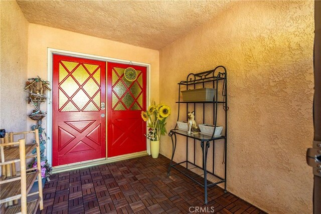 43657 21st St W, Lancaster, CA 93536 - doorway to property featuring stucco siding