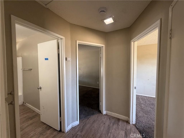 15569 Athol St, Fontana, CA 92335 - hallway with wood finished floors and baseboards