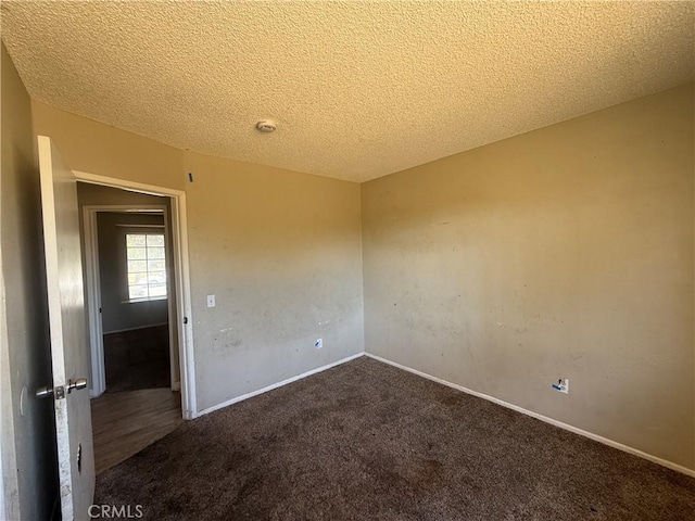 15569 Athol St, Fontana, CA 92335 - unfurnished room with carpet floors and a textured ceiling