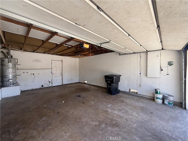 15569 Athol St, Fontana, CA 92335 - garage with a garage door opener and secured water heater
