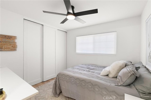 10171 Kukui Dr, Huntington Beach, CA 92646 - bedroom with light wood-type flooring, a ceiling fan, and a closet