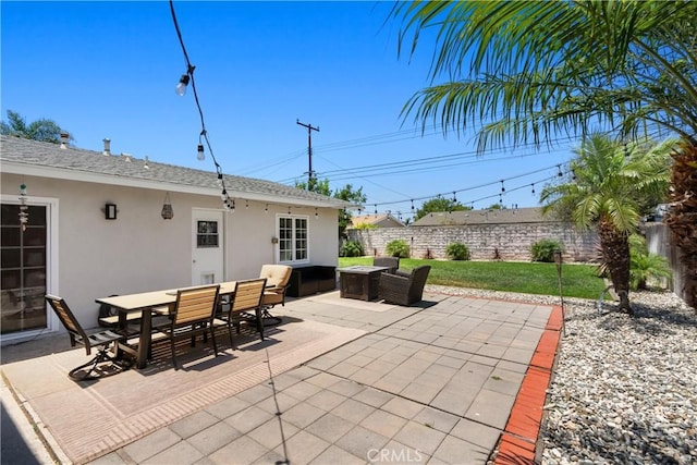 10171 Kukui Dr, Huntington Beach, CA 92646 - fenced backyard with outdoor dining area and a patio