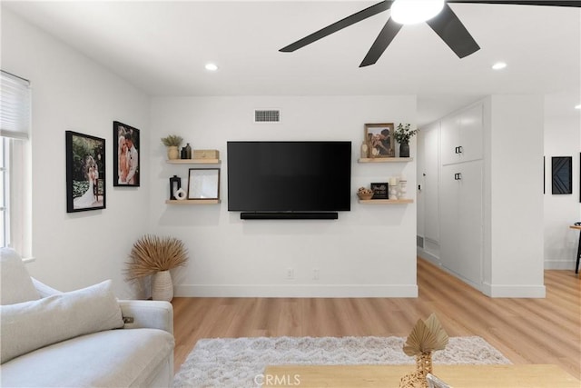 10171 Kukui Dr, Huntington Beach, CA 92646 - living room with light wood-style floors, a ceiling fan, and recessed lighting