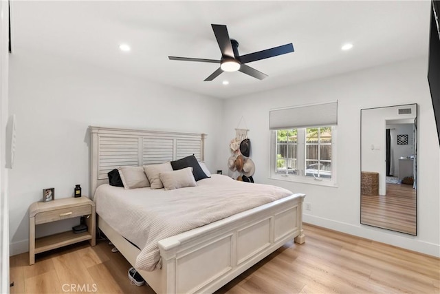 10171 Kukui Dr, Huntington Beach, CA 92646 - bedroom with light wood-type flooring, recessed lighting, and ceiling fan