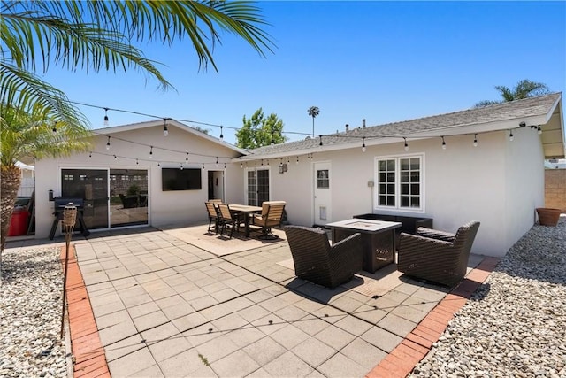 10171 Kukui Dr, Huntington Beach, CA 92646 - view of patio with outdoor dining area, an outdoor fire pit, and grilling area