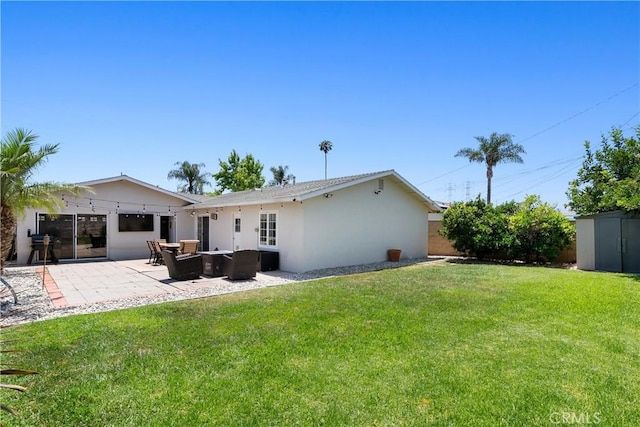 10171 Kukui Dr, Huntington Beach, CA 92646 - back of property featuring stucco siding, a patio, and outdoor lounge area