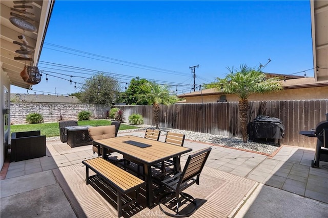 10171 Kukui Dr, Huntington Beach, CA 92646 - fenced backyard with outdoor dining area, a patio area, and a grill