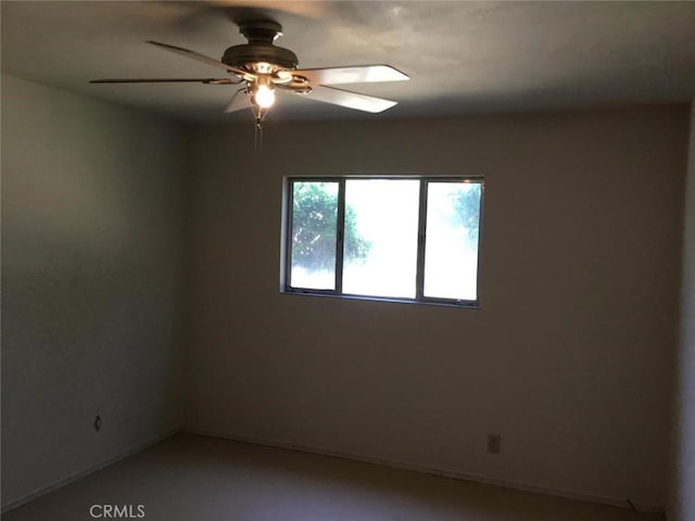 2911 Tahoe Dr, Merced, CA 95340 - spare room featuring a ceiling fan and baseboards