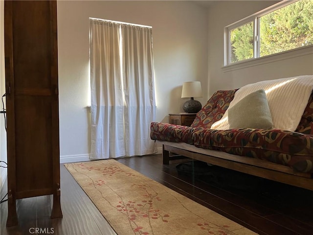 6914 Andasol Ave, Van Nuys, CA 91406 - sitting room featuring dark wood-style floors and baseboards