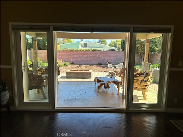 6914 Andasol Ave, Van Nuys, CA 91406 - entryway featuring plenty of natural light and dark wood-type flooring