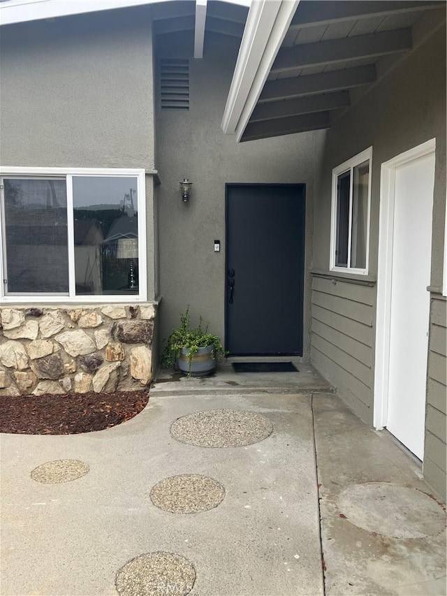 6914 Andasol Ave, Lake Balboa, CA 91406 - view of exterior entry with stucco siding and stone siding
