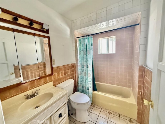 2516 Tamora Ave, South El Monte, CA 91733 - full bathroom with tile walls, vanity, shower / bath combination with curtain, tile patterned flooring, and wainscoting