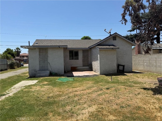 2516 Tamora Ave, South El Monte, CA 91733 - rear view of house featuring stucco siding and a shingled roof