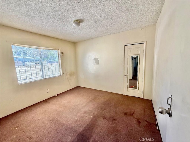 2516 Tamora Ave, South El Monte, CA 91733 - unfurnished room featuring carpet and a textured ceiling