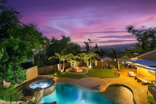 245 S Via Montanera, Anaheim Hills, CA 92807 - view of swimming pool featuring an in-ground hot tub, a fenced backyard, a patio area, and an outdoor fire pit