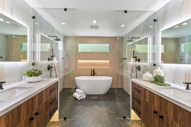 245 S Via Montanera, Anaheim Hills, CA 92807 - bathroom with tile walls, two vanities, a walk in shower, a soaking tub, and recessed lighting