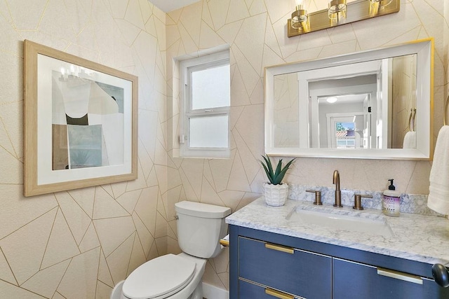 245 S Via Montanera, Anaheim Hills, CA 92807 - bathroom with tile walls, vanity, healthy amount of natural light, and decorative backsplash
