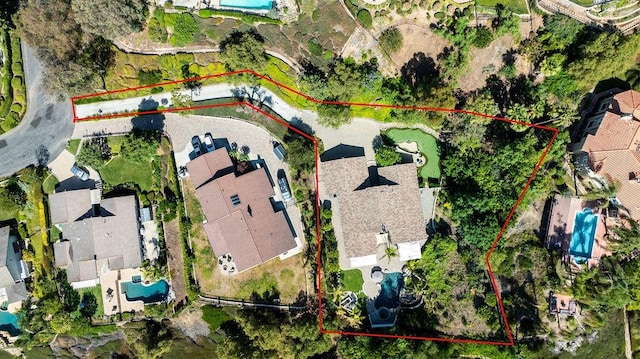 245 S Via Montanera, Anaheim Hills, CA 92807 - aerial overview of property's location with a pool area and property boundaries highlighted