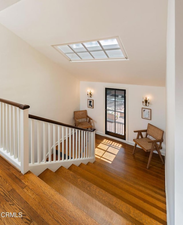 1241 S Oak Knoll Ave, Pasadena, CA 91106 - staircase with wood finished floors and a skylight