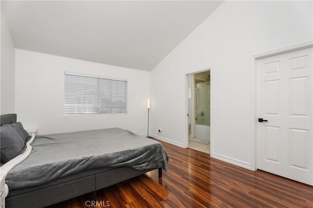 11521 Double Eagle Dr, Whittier, CA 90604 - bedroom featuring lofted ceiling, wood finished floors, and connected bathroom