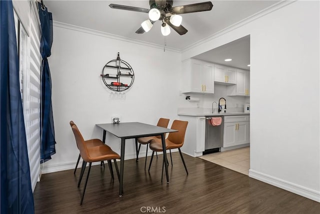 11521 Double Eagle Dr, Whittier, CA 90604 - dining area featuring ornamental molding, a ceiling fan, and light wood-style flooring