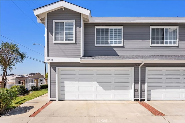 11521 Double Eagle Dr, Whittier, CA 90604 - traditional-style house featuring an attached garage and driveway