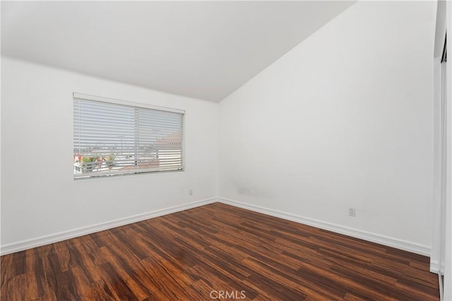 11521 Double Eagle Dr, Whittier, CA 90604 - spare room featuring dark wood-style floors and vaulted ceiling