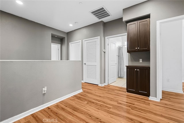 7600 N Courage Way, Van Nuys, CA 91405 - hall featuring light wood-type flooring and recessed lighting