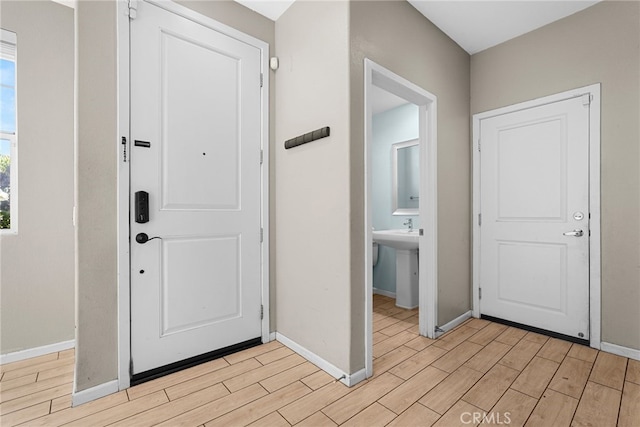 7600 N Courage Way, Van Nuys, CA 91405 - entrance foyer featuring light wood-style floors and baseboards