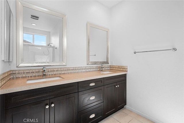 7600 N Courage Way, Van Nuys, CA 91405 - full bathroom featuring double vanity, tile patterned flooring, and a shower