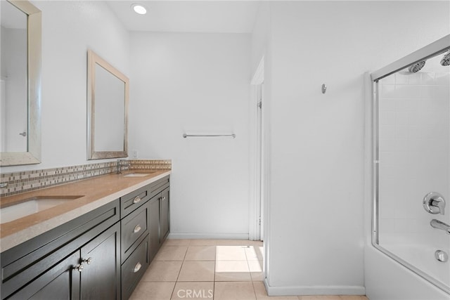 7600 N Courage Way, Van Nuys, CA 91405 - bathroom featuring double vanity, shower / washtub combination, tile patterned floors, decorative backsplash, and recessed lighting