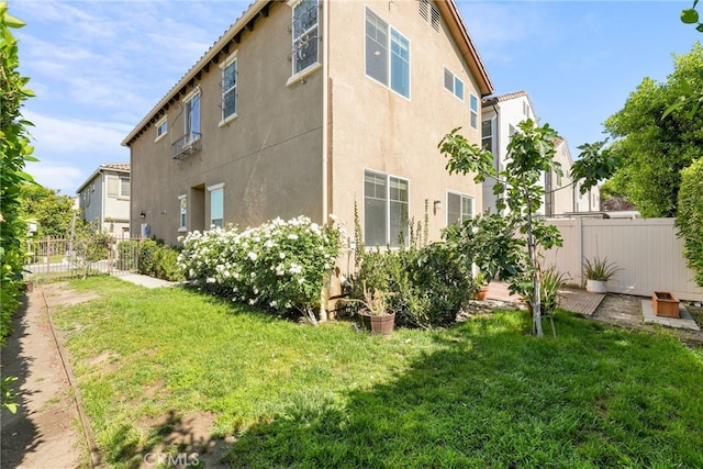 7600 N Courage Way, Van Nuys, CA 91405 - rear view of property with stucco siding