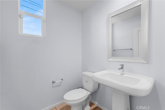 7600 N Courage Way, Van Nuys, CA 91405 - bathroom with toilet and wood finished floors
