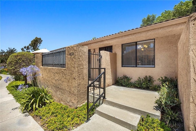 4692 Lakeview Ave Unit 8, Yorba Linda, CA 92886 - entrance to property featuring stucco siding and a gate