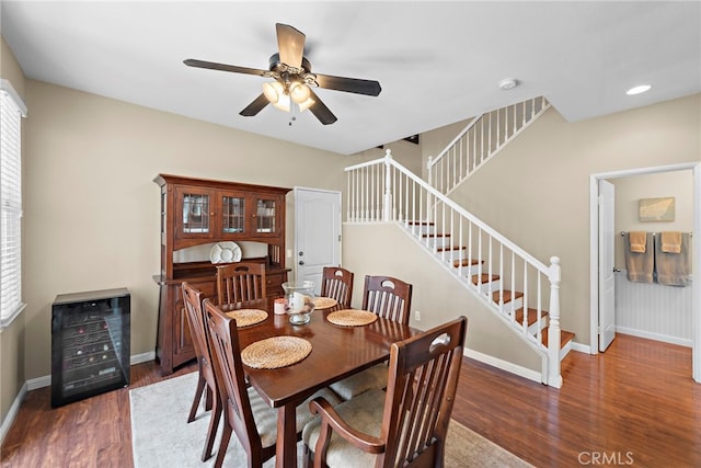 81 Mercantile Way, Ladera Ranch, CA 92694 - dining room featuring beverage cooler, stairs, a ceiling fan, and wood finished floors