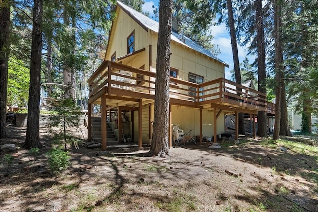 26251 Alpine Ln, Twin Peaks, CA 92391 - back of house with a wooden deck and stairway