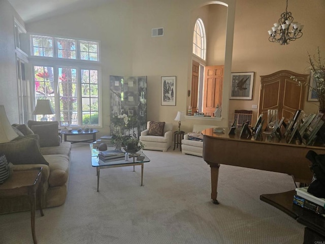 4970 Beauchamp Ct, San Diego, CA 92130 - carpeted living area featuring high vaulted ceiling, arched walkways, healthy amount of natural light, and a chandelier