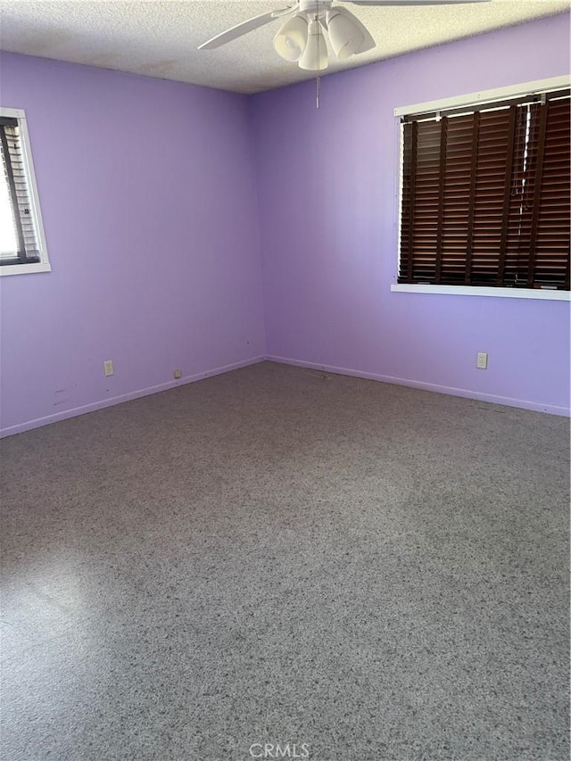 7395 Sage Ave, Yucca Valley, CA 92284 - carpeted spare room featuring ceiling fan and a textured ceiling