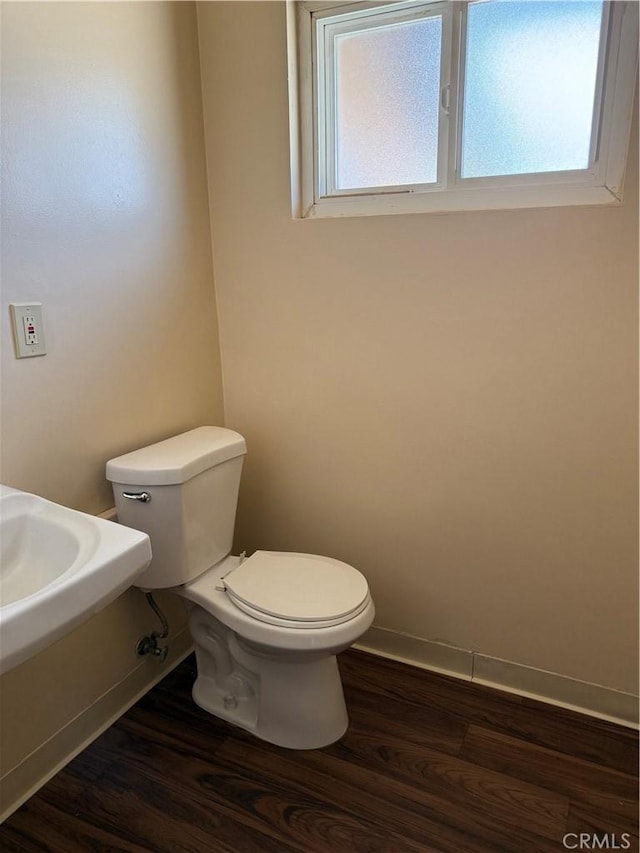 7395 Sage Ave, Yucca Valley, CA 92284 - bathroom with toilet and wood finished floors