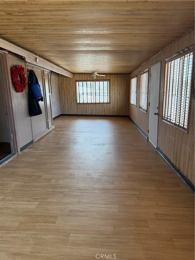 7395 Sage Ave, Yucca Valley, CA 92284 - empty room featuring light wood-style flooring, wooden ceiling, and a ceiling fan