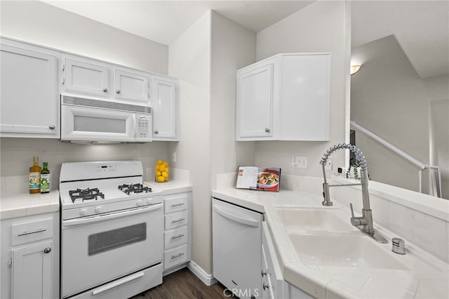 811 Larkridge, Irvine, CA 92618 - kitchen with white appliances, white cabinetry, and dark wood-type flooring