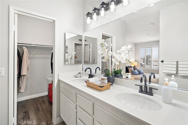 811 Larkridge, Irvine, CA 92618 - full bath featuring wood finished floors, double vanity, and a spacious closet