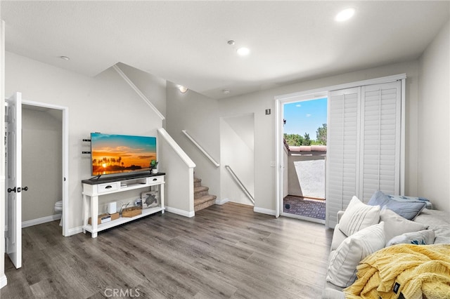 811 Larkridge, Irvine, CA 92618 - living room featuring wood finished floors, stairs, and recessed lighting