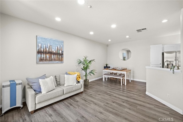 811 Larkridge, Irvine, CA 92618 - living room with wood finished floors and recessed lighting
