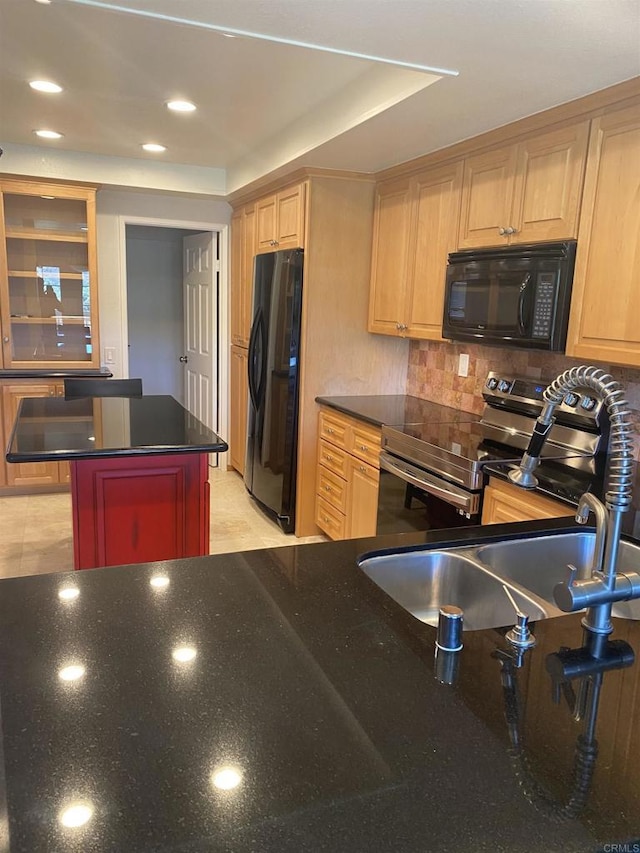 5983 Gaines St, San Diego, CA 92110 - kitchen with black appliances, tasteful backsplash, light brown cabinetry, recessed lighting, and a center island