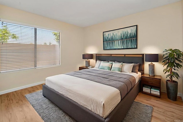 5983 Gaines St, San Diego, CA 92110 - bedroom featuring wood finished floors