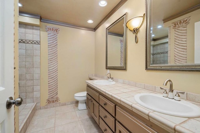 5983 Gaines St, San Diego, CA 92110 - full bath featuring ornamental molding, double vanity, tile patterned flooring, a tile shower, and recessed lighting